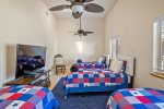 Twin bedroom is equipped with a very large Smart TV and Playstation 4.  Games not included, 1 remote provided.